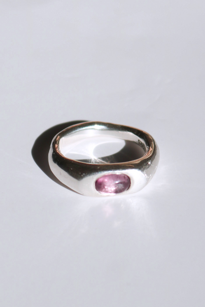 Odissea Aurelia ring in polished sterling silver with a smooth, rounded dome and a pink cabochon tourmaline stone.
